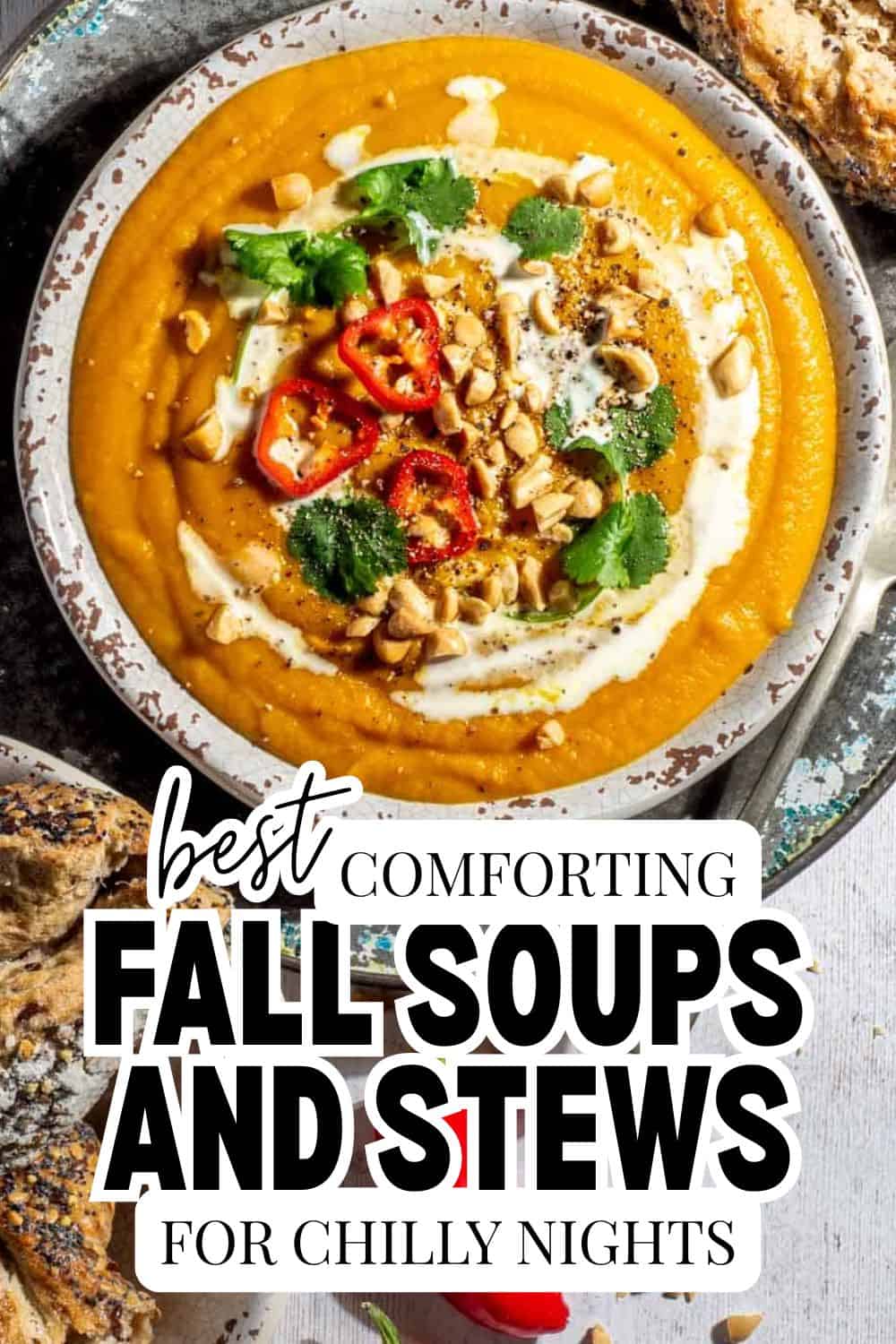 A bowl of creamy pumpkin soup topped with nuts and herbs, perfect for fall evenings.