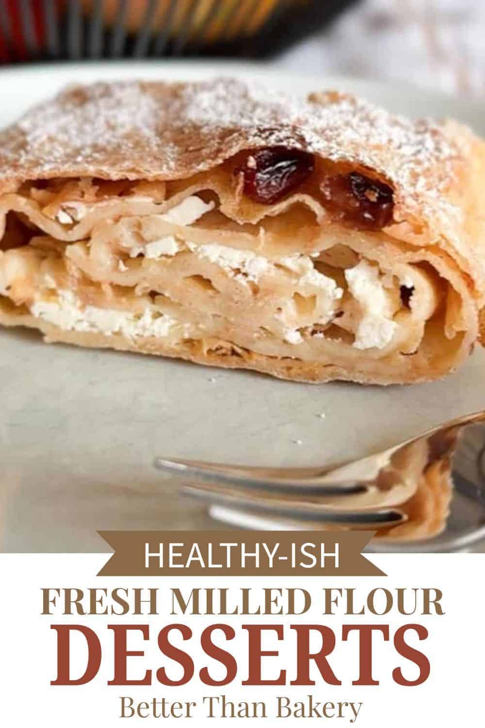Delicious homemade dessert with fresh milled flour, dried fruit, and powdered sugar.