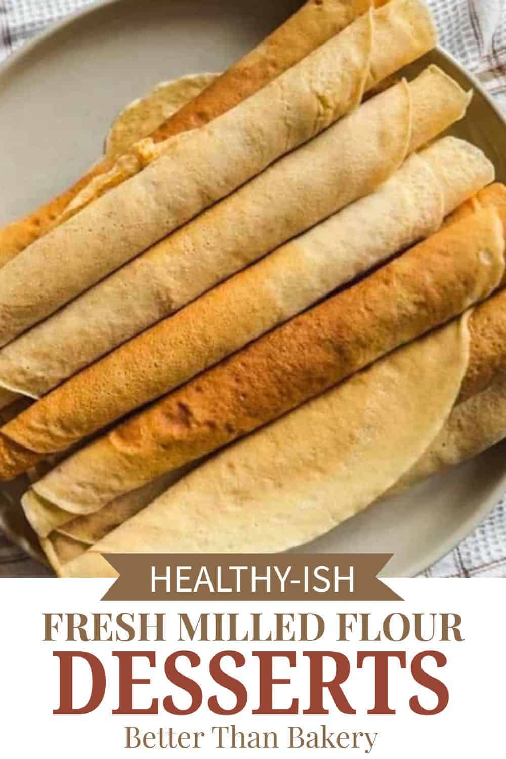 Assorted fresh milled flour wraps and baked desserts on a plate, highlighting healthy baking options.