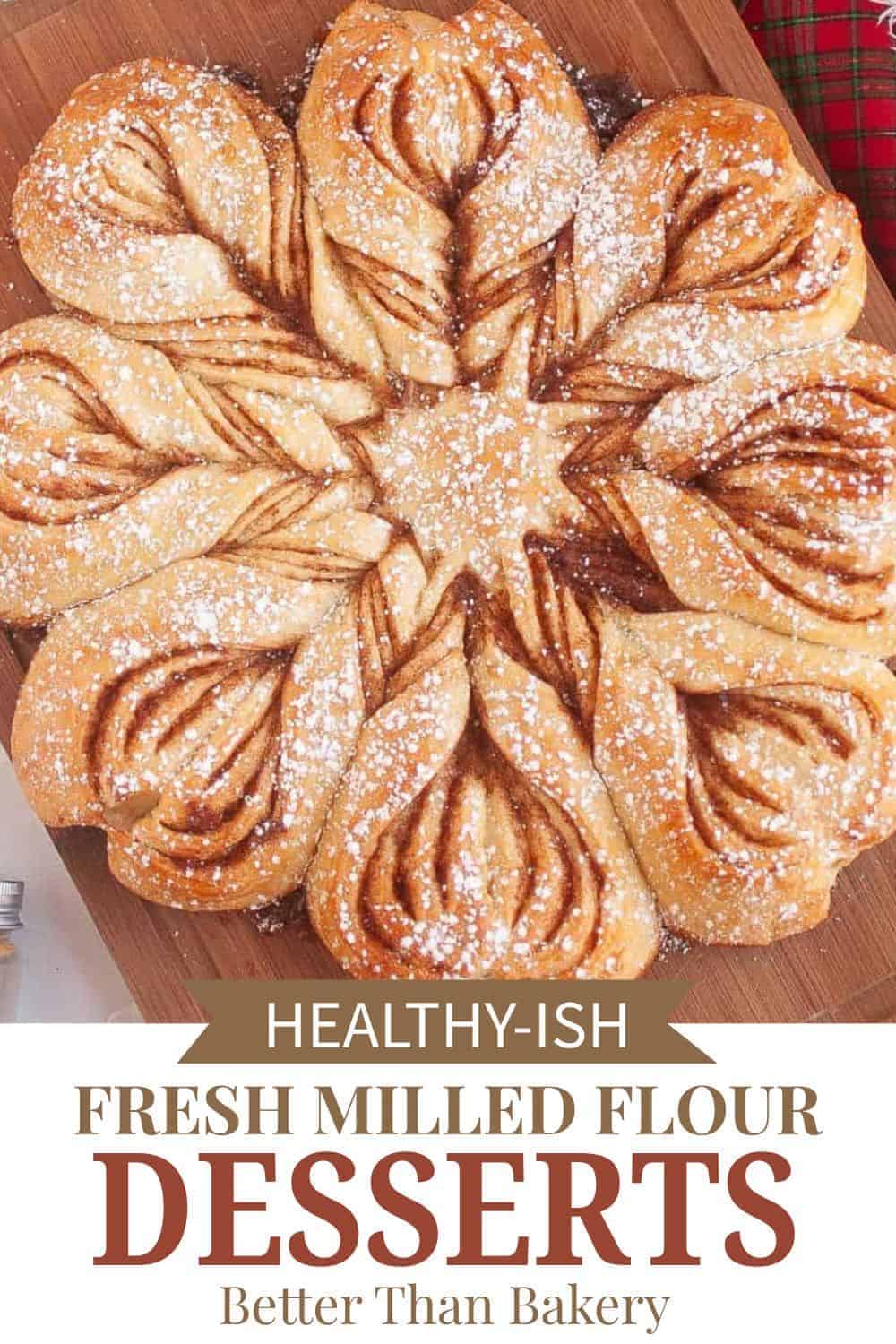 Beautifully arranged baked desserts with powdered sugar on top.