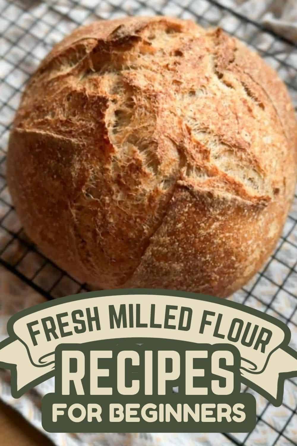 Freshly baked bread made with freshly milled flour on a cooling rack.