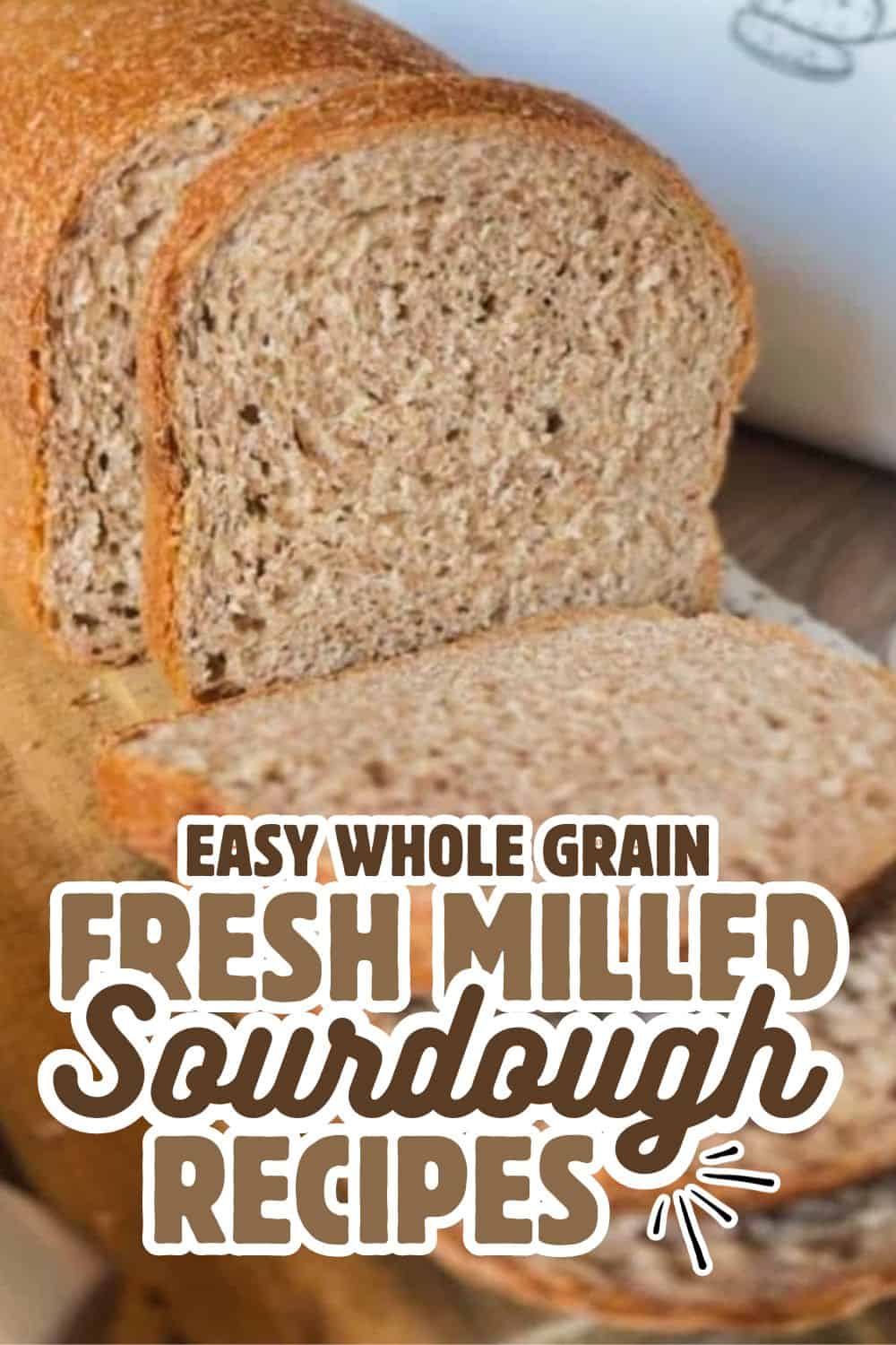 Fresh whole grain sourdough bread loaf with slices, baked to perfection.