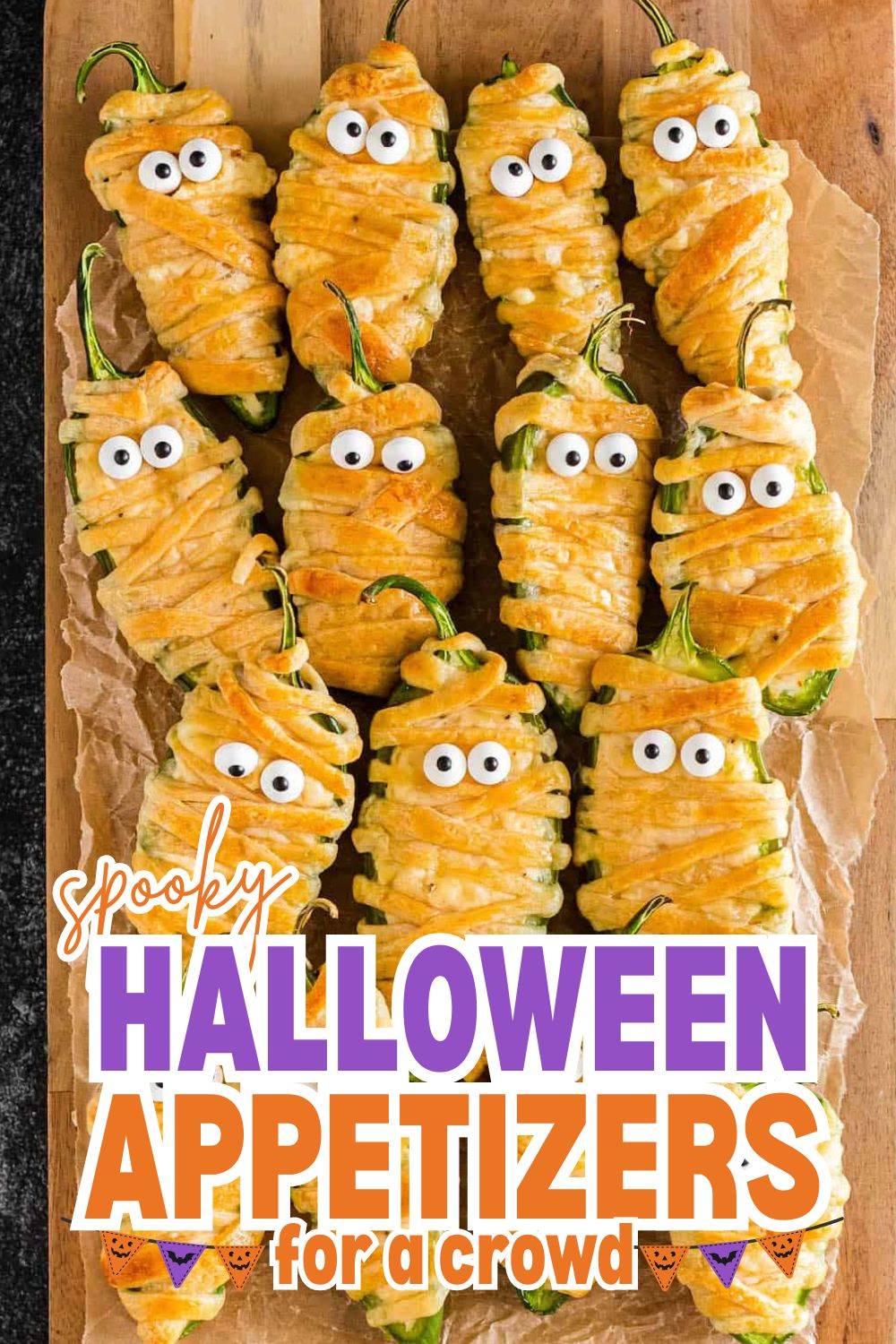 Spooky Halloween appetizers with googly eyes and peppers for a crowd.