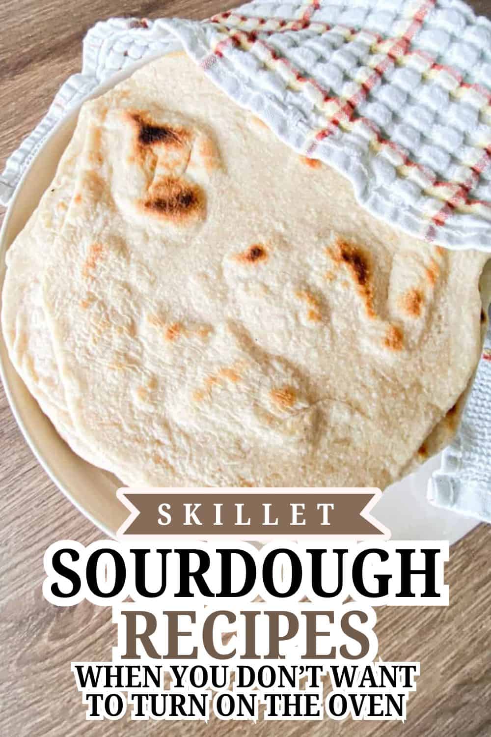 Freshly baked skillet sourdough bread with a crispy crust and soft interior.