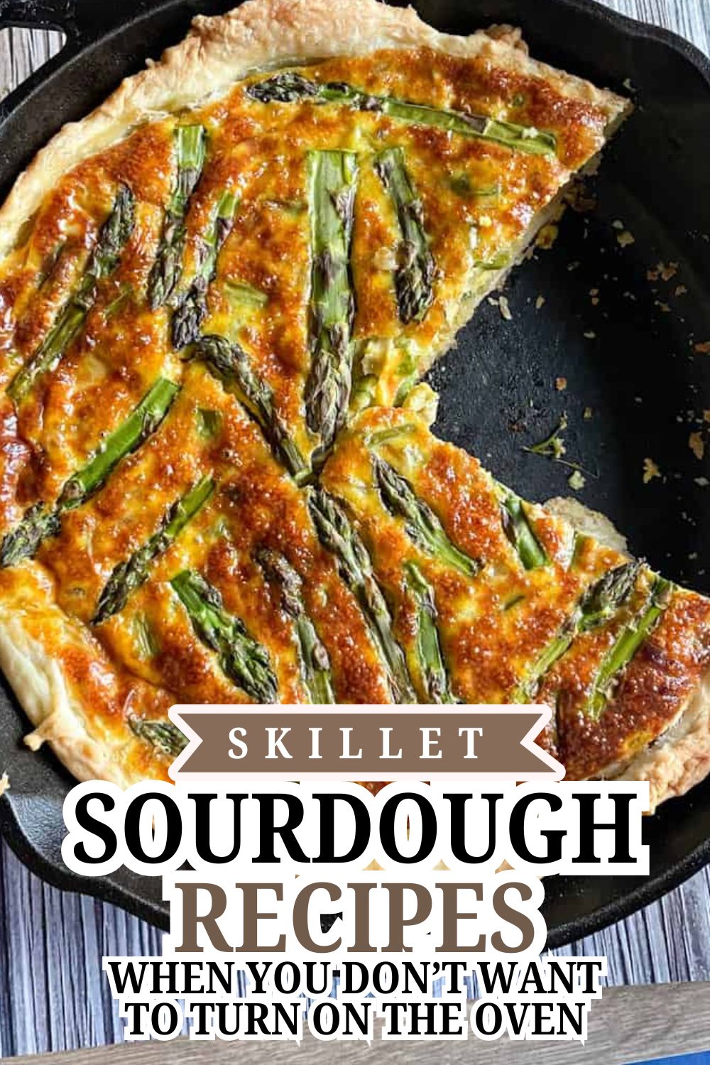 Delicious skillet sourdough pizza topped with asparagus and cheese.