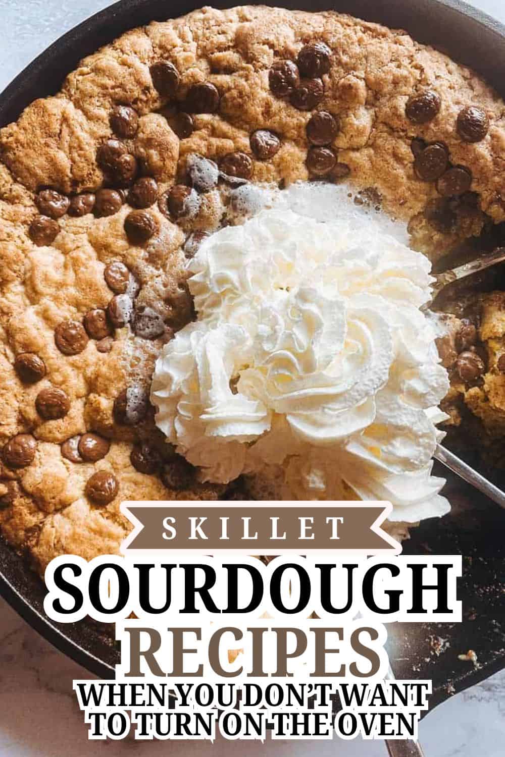 Delicious skillet sourdough bread with chocolate chips and whipped cream topping.