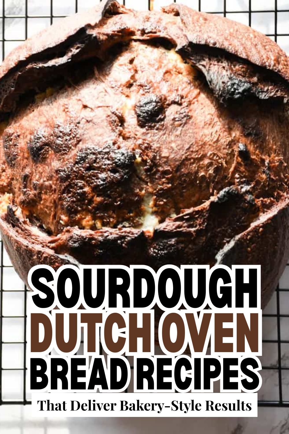 Freshly baked sourdough bread cooling on a wire rack, crusty and golden brown.
