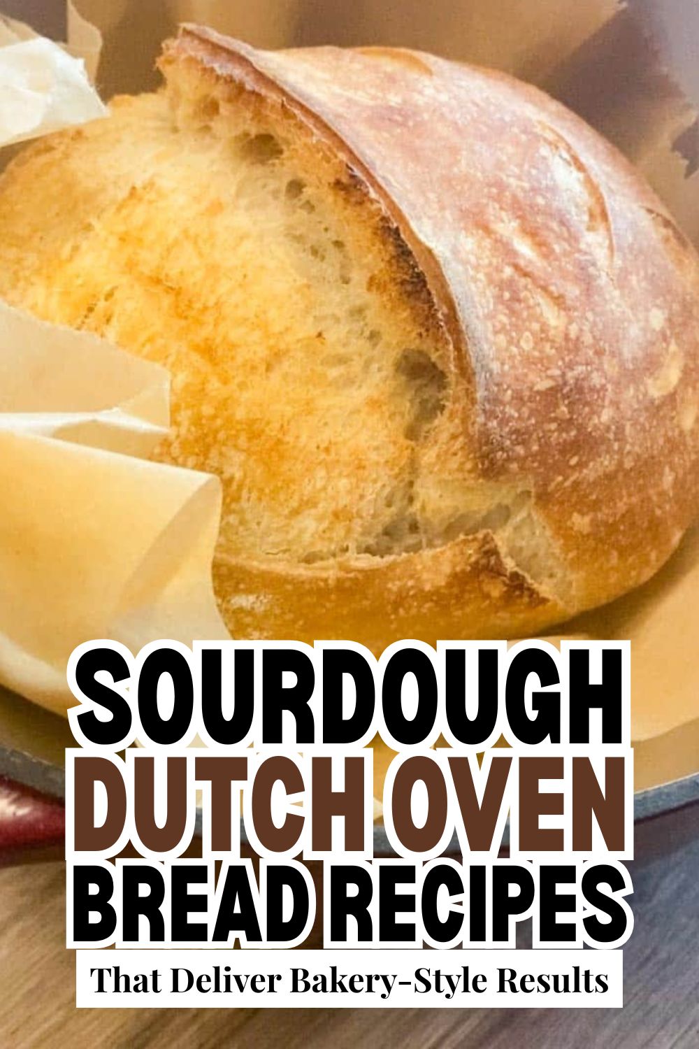 Freshly baked sourdough bread in a Dutch oven, crusty and golden.