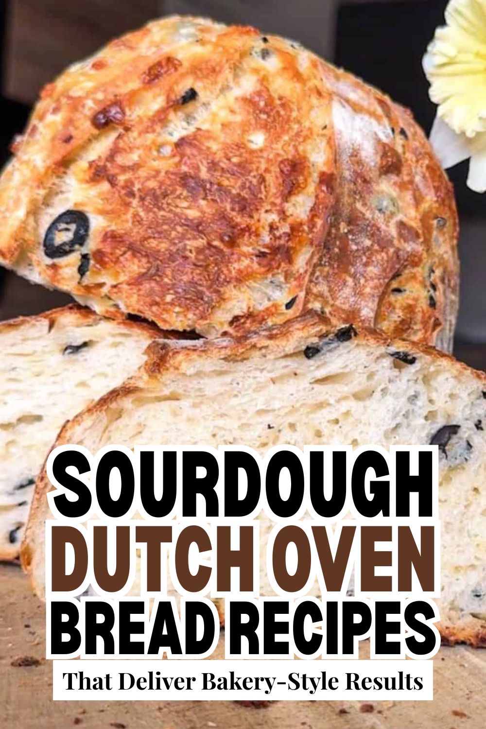 Freshly baked sourdough bread with a crispy crust and airy crumb, made using Dutch oven baking techn.