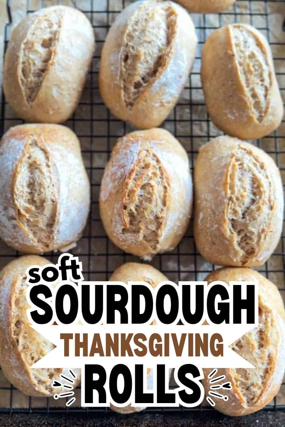 Freshly baked sourdough rolls on a cooling rack for Thanksgiving.