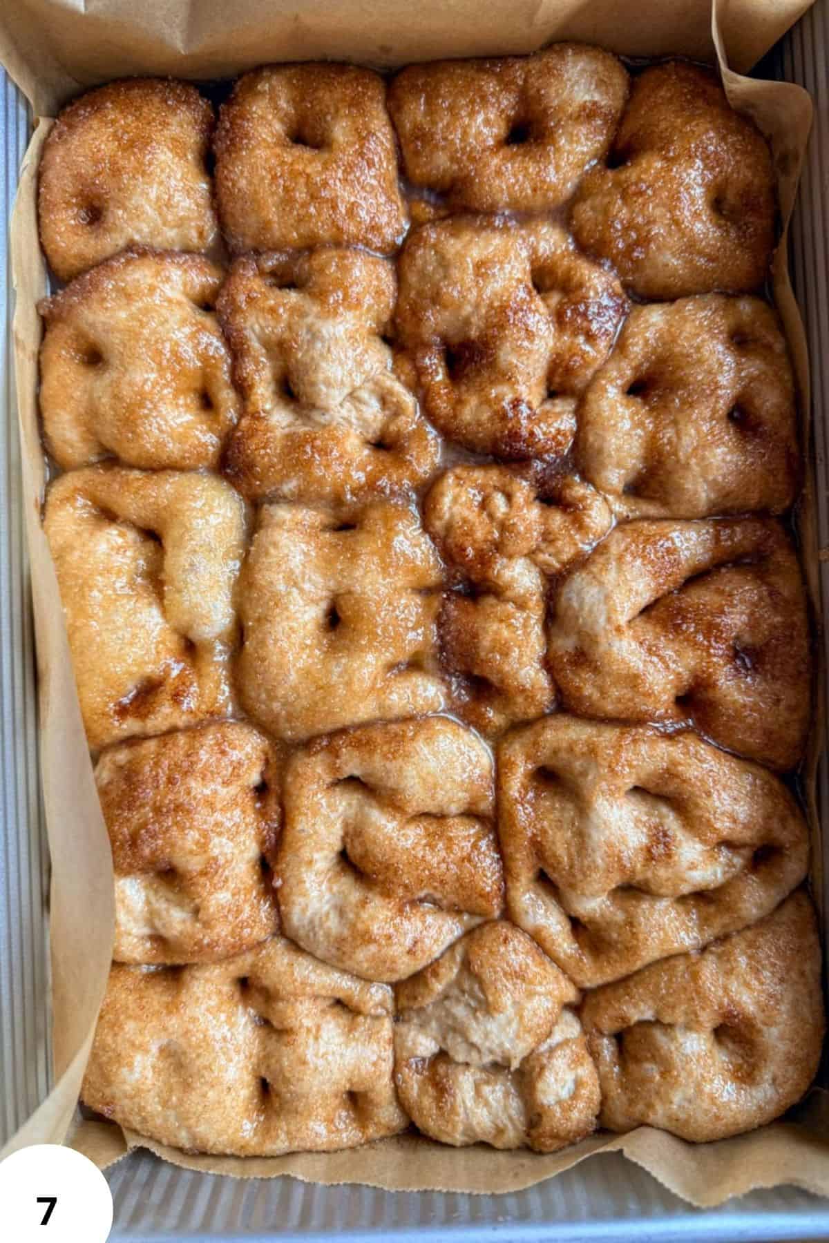 Close-up of cinnamon roll pull-apart focaccia with sugar glaze.