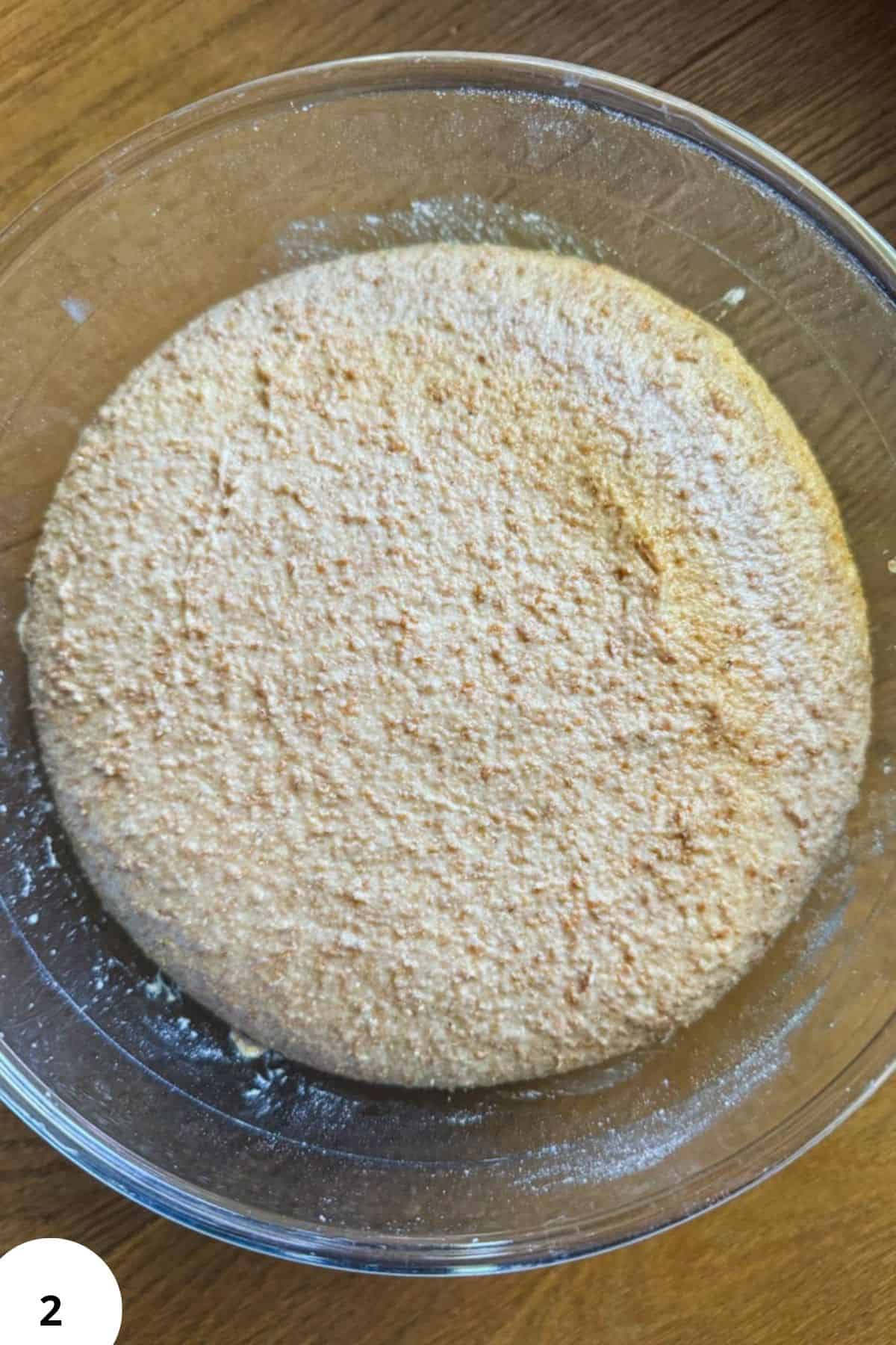 Close-up of freshly milled sourdough bread flour in a glass bowl.