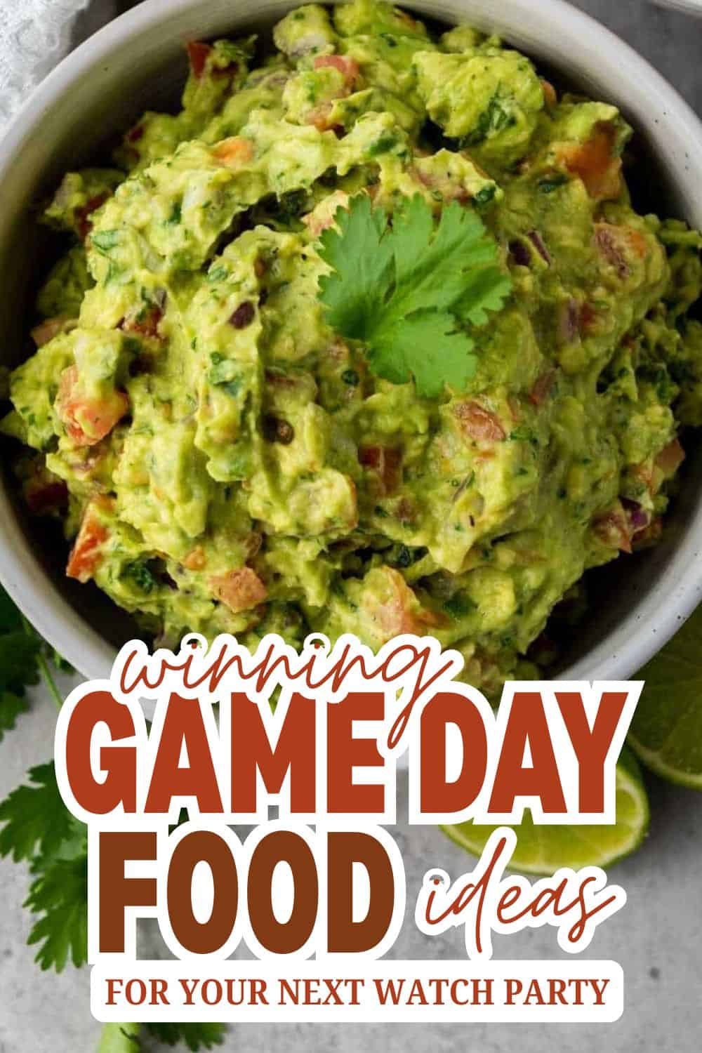 Close-up of fresh guacamole with cilantro on top, perfect for game day snacks.