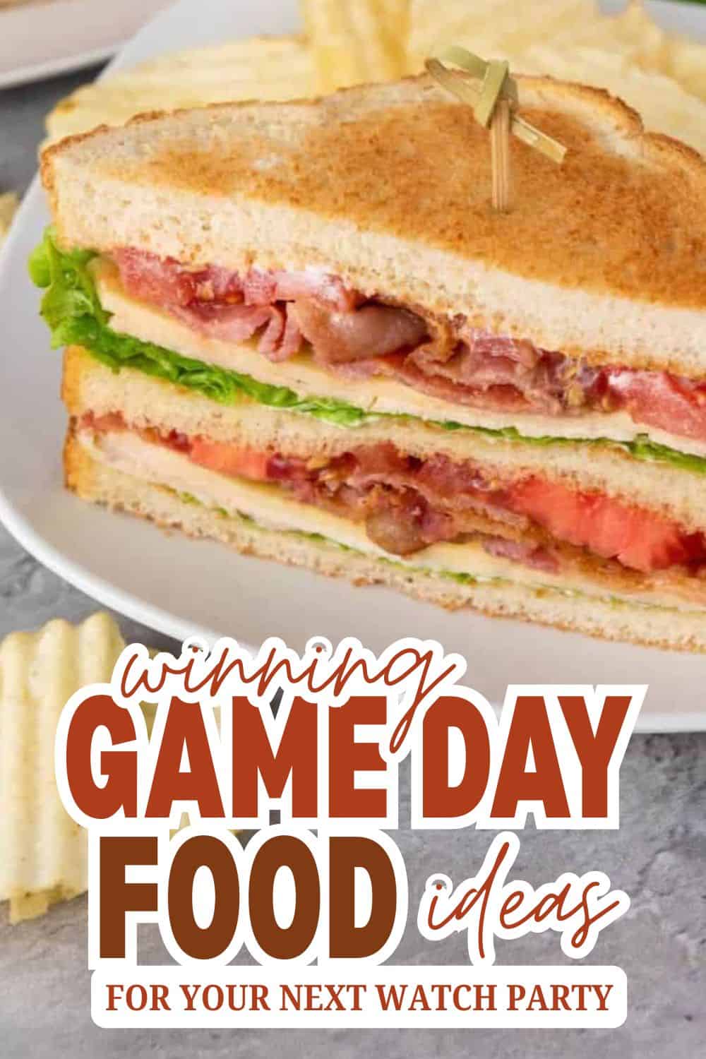 Close-up of a toasted sandwich with bacon, lettuce, and tomato slices.
