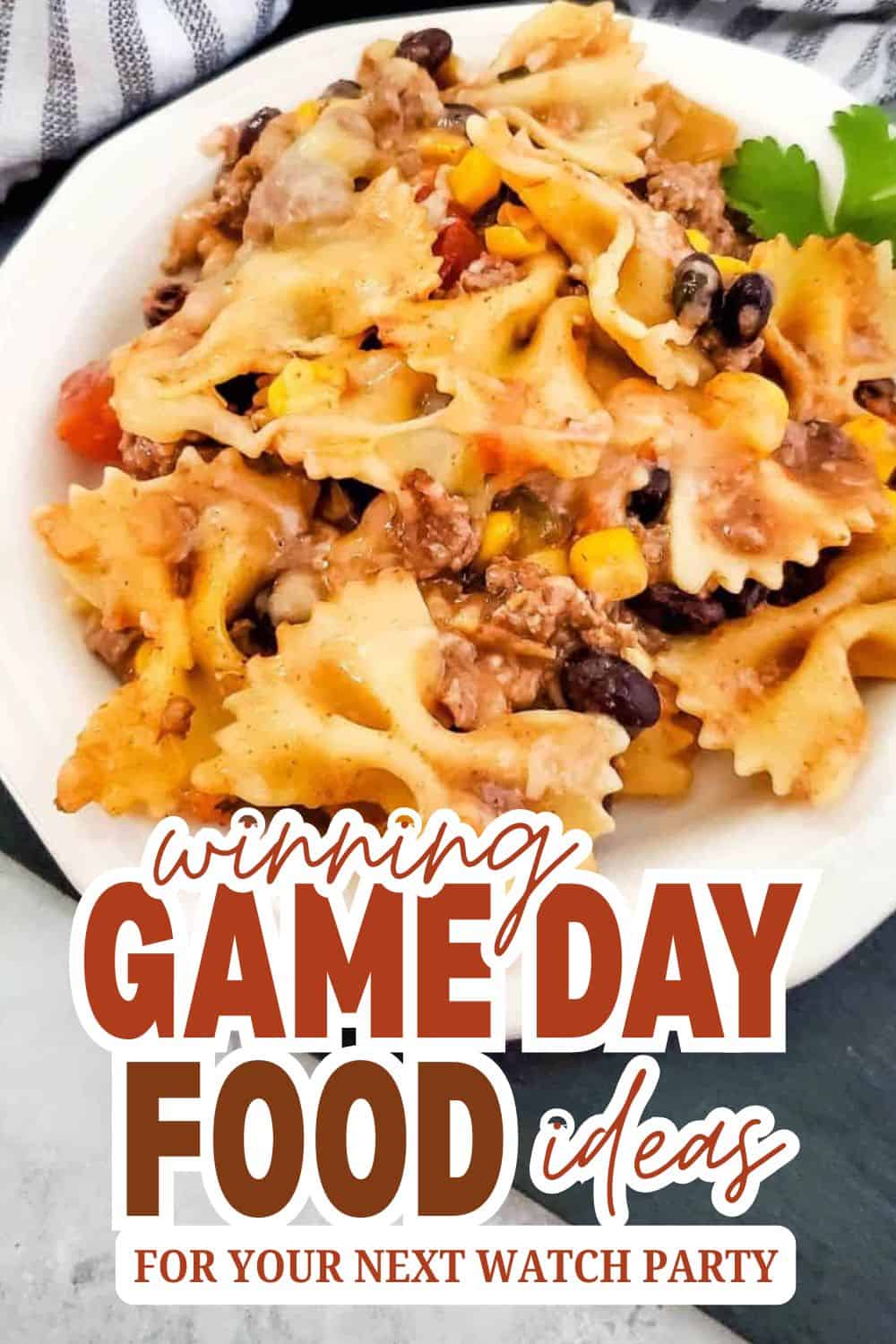 Delicious pasta salad with ground beef, corn, and black beans for game day.