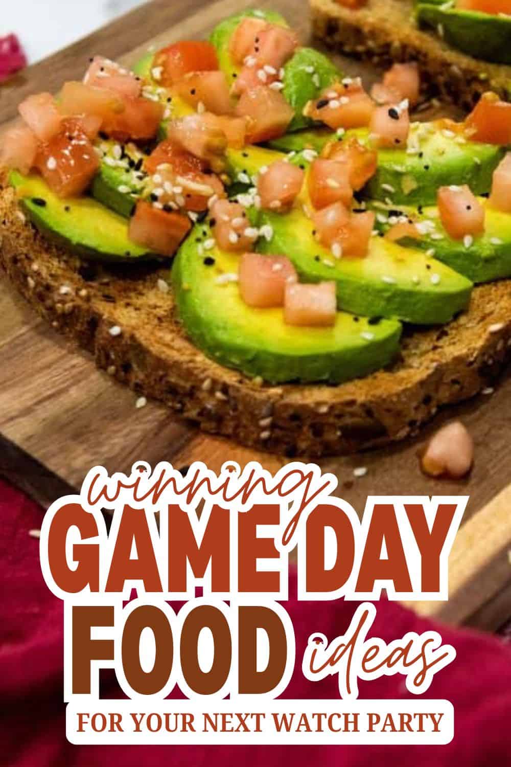 Avocado toast topped with salmon, sesame seeds, and diced vegetables on whole grain bread.