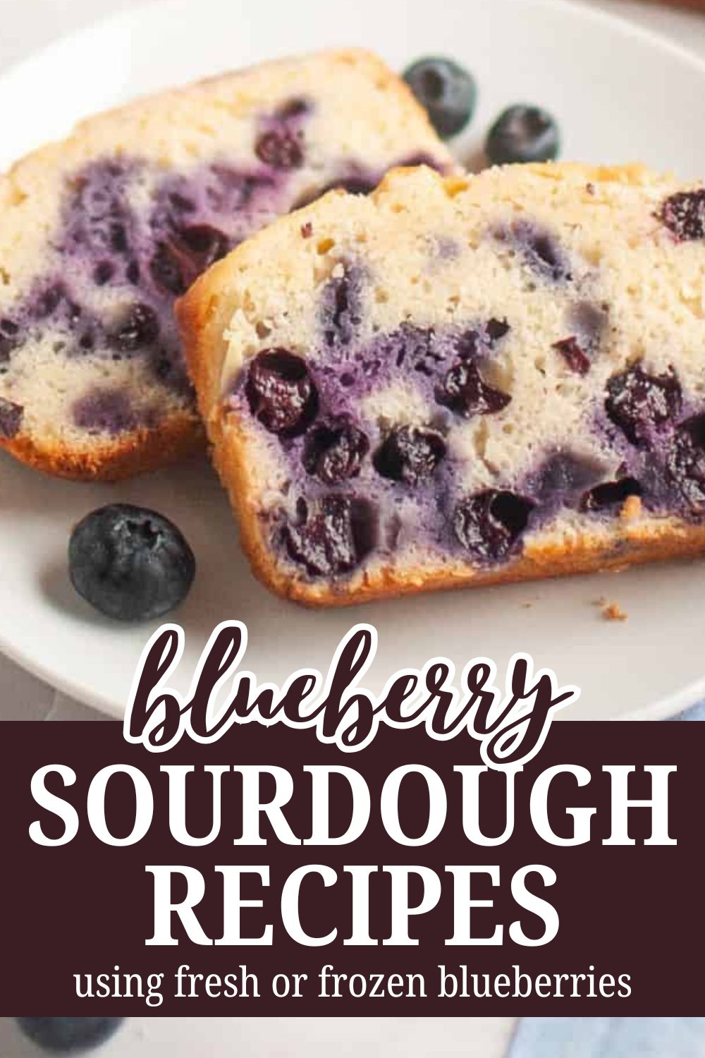 Blueberry sourdough bread slices with fresh blueberries on a plate.