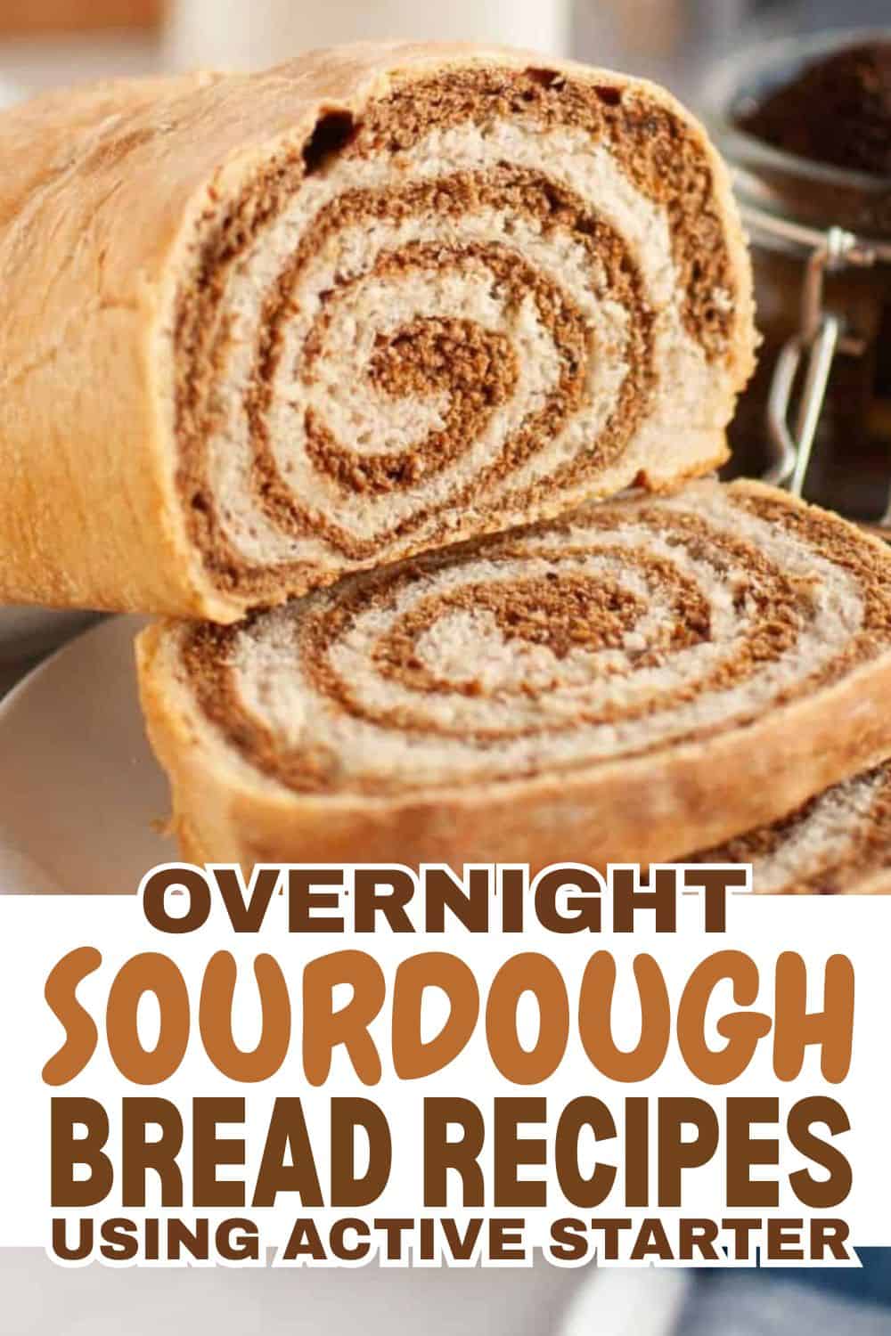Close-up of a sliced sourdough bread roll showing spiral pattern.