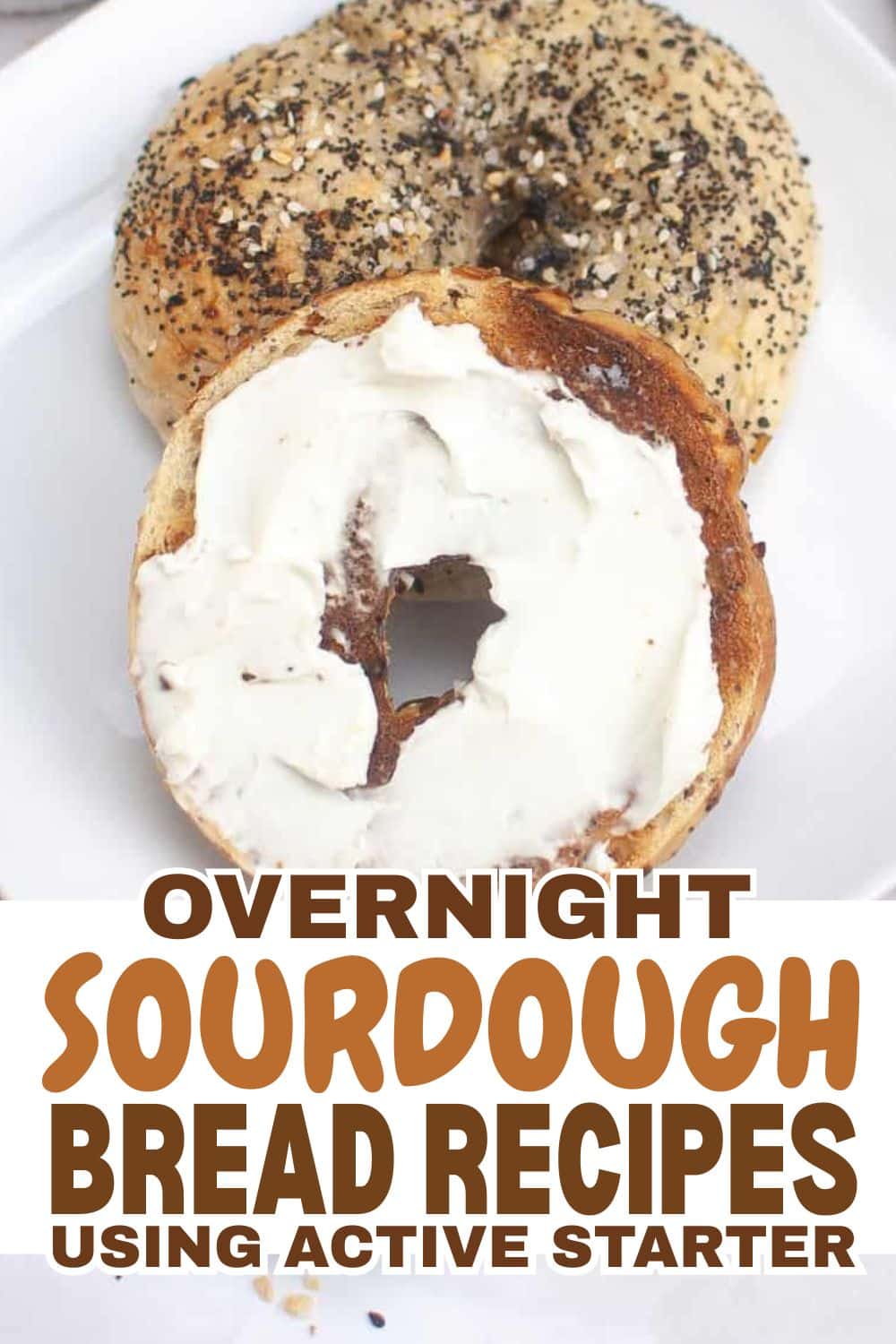 Freshly baked sourdough bread with poppy seeds and a bagel with cream cheese.