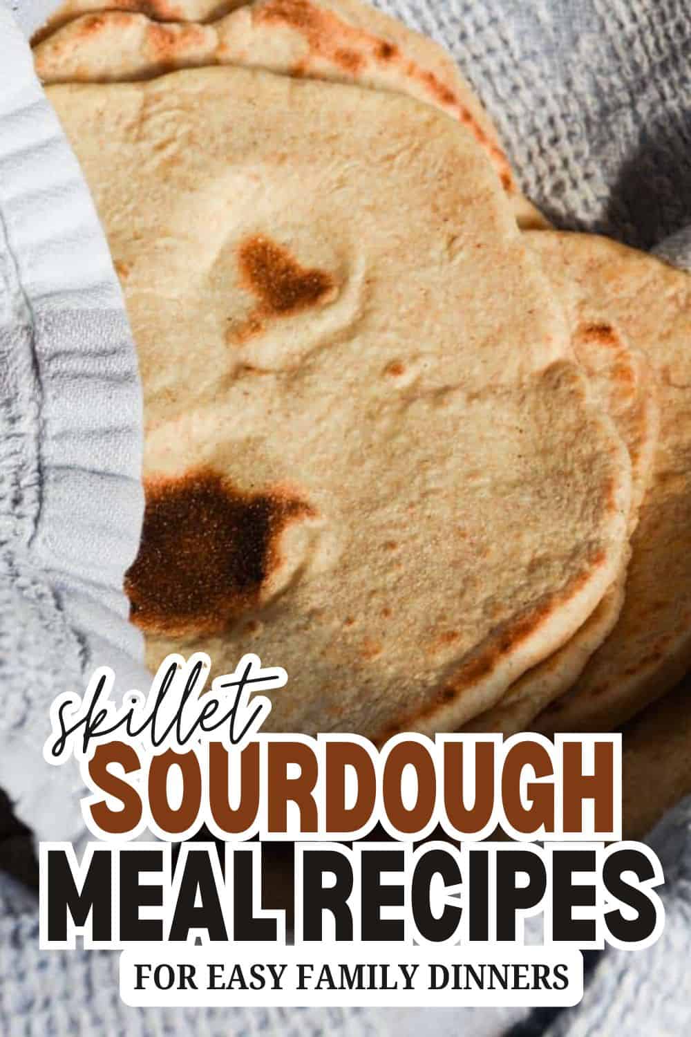 Fresh sourdough bread with a golden crust, perfect for family meals and baking at home.