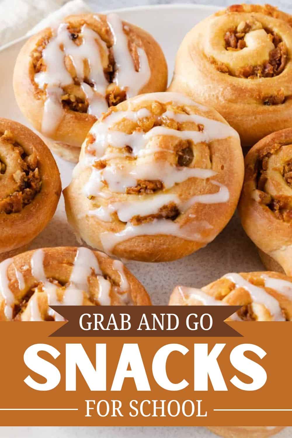 Delicious cinnamon rolls with icing, perfect for school snacks from Stretch and Folds.