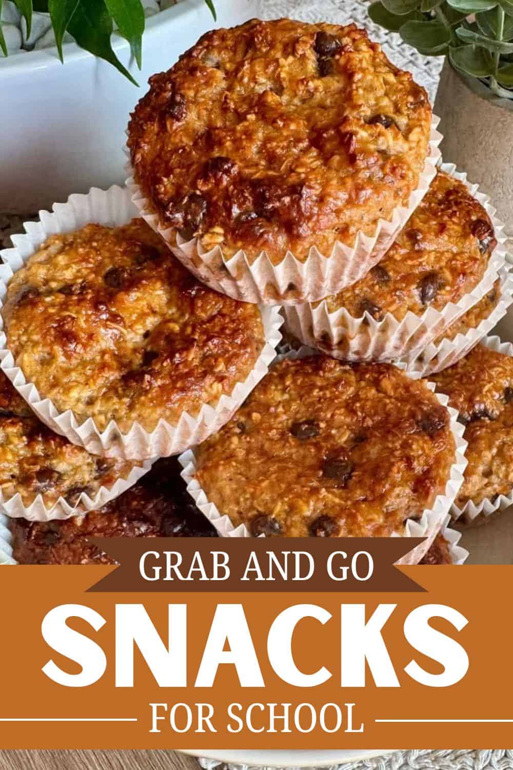 Freshly baked muffins in paper cups, perfect for school snacks.