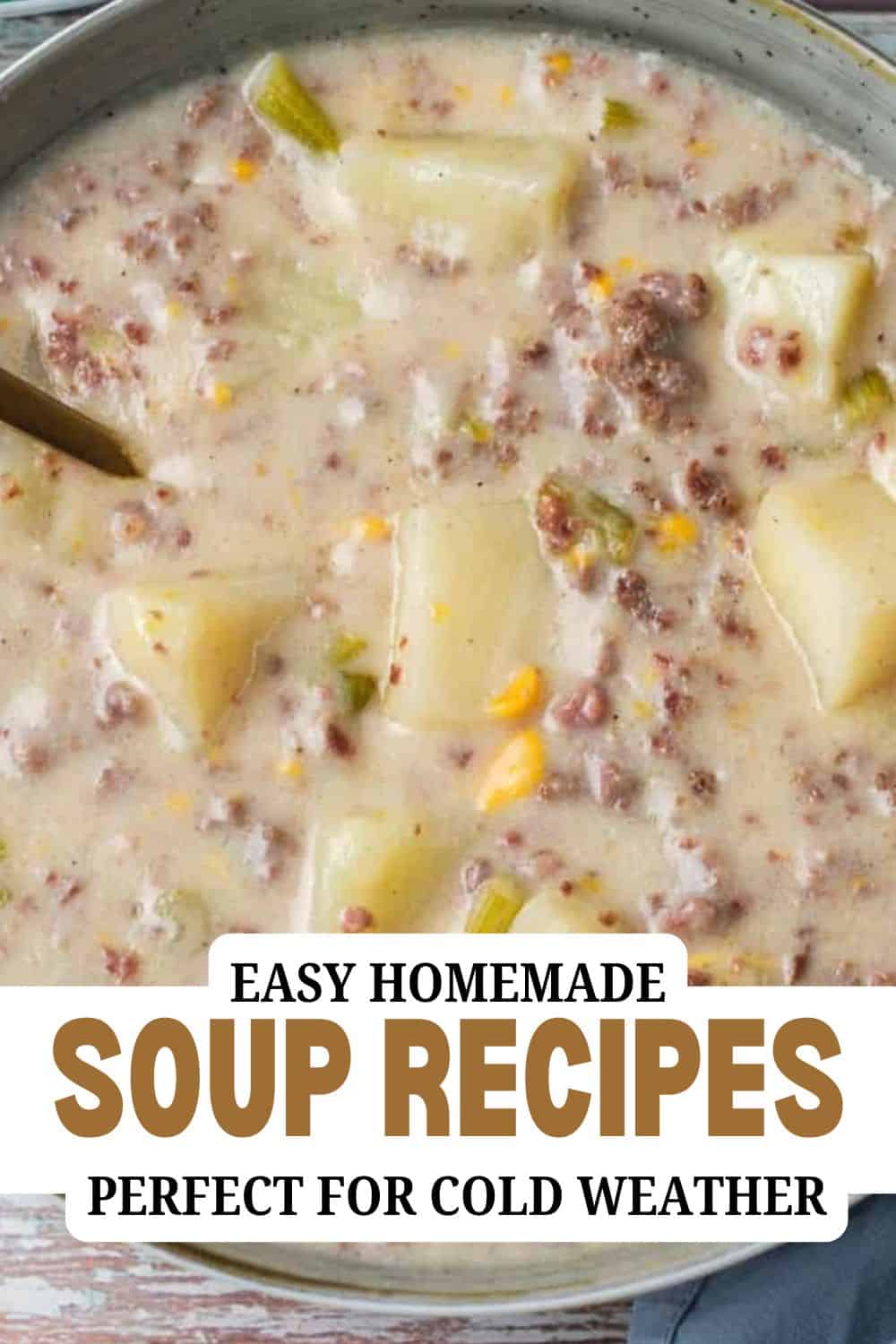Creamy homemade soup with potatoes, ground meat, and vegetables in a bowl.