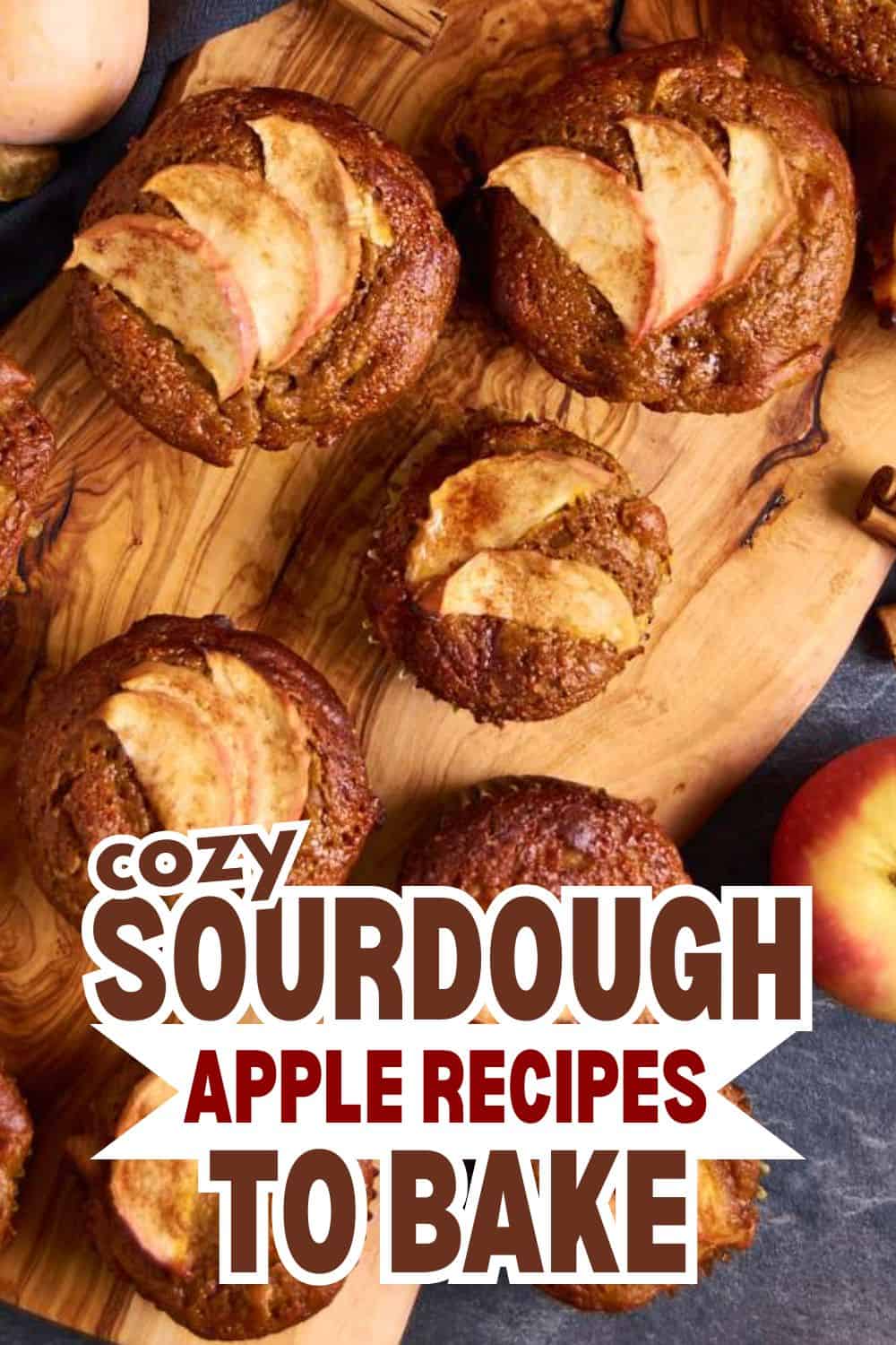 Freshly baked sourdough apple bread slices on a wooden board.
