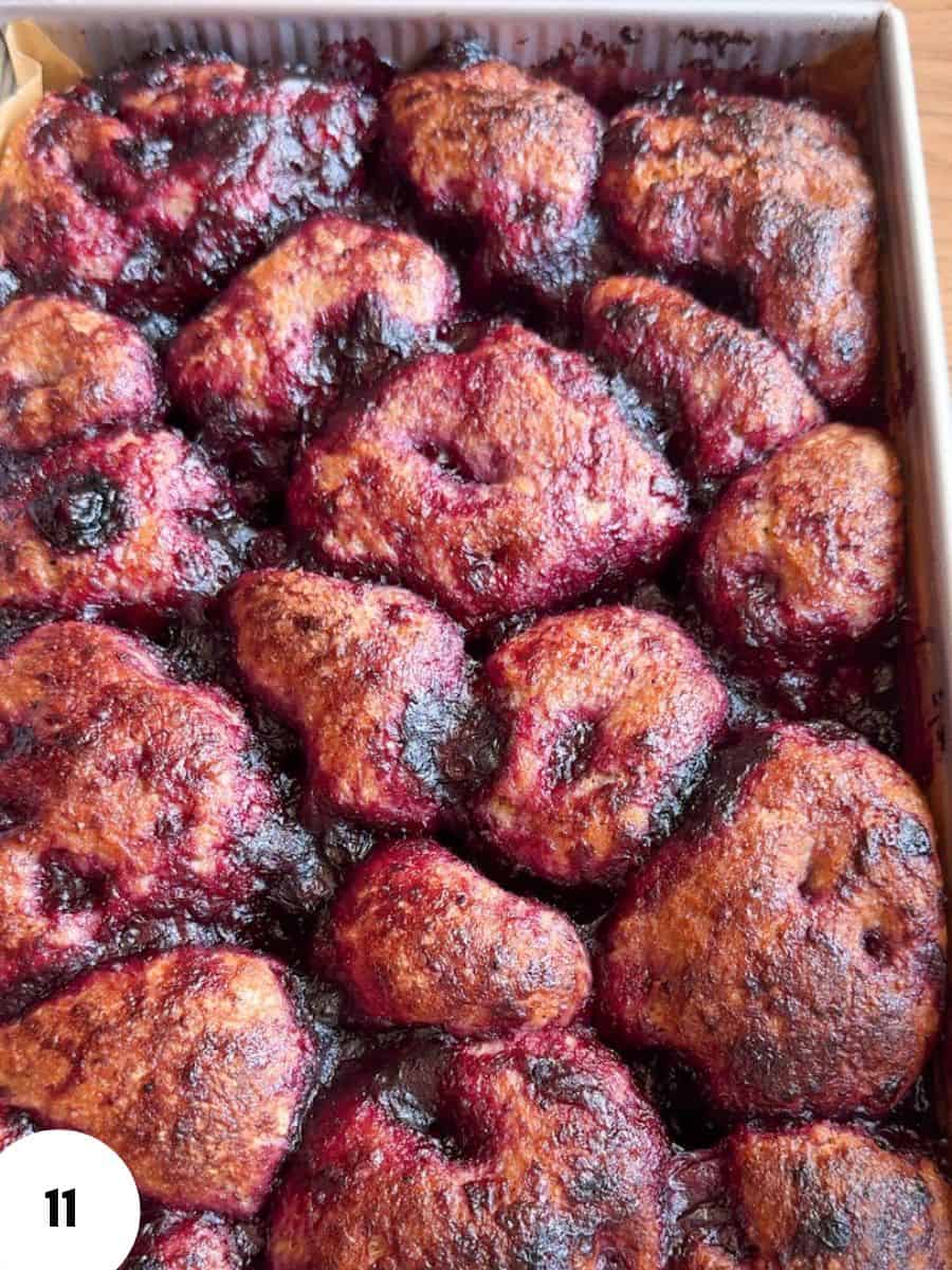 Close-up of golden-brown bread rolls with a crispy crust.