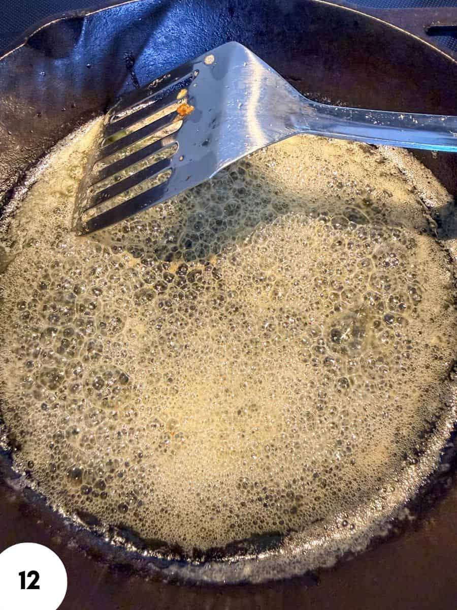 Melting butter in a skillet for bread or pastry preparation.