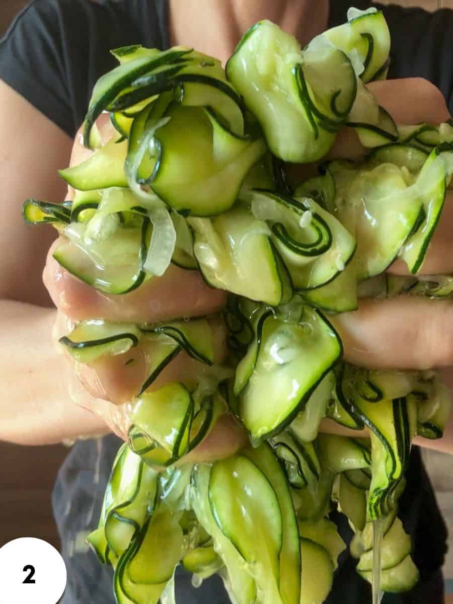 Close-up of green zucchini and cucumber slices for bread dough stretch and folds.