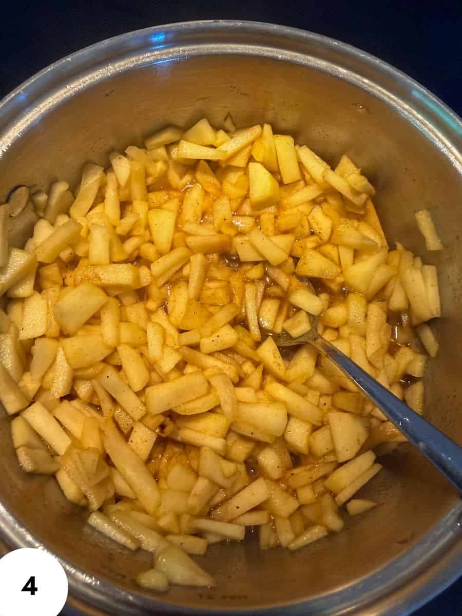 Chopped apples in a pot ready for cooking or baking.