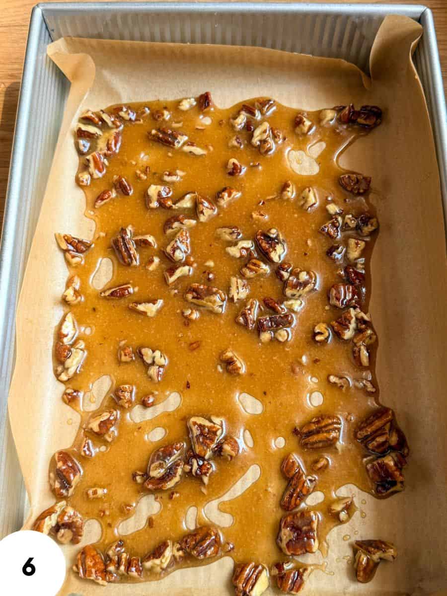 Freshly baked sourdough focaccia topped with caramelized pecans and honey glaze.