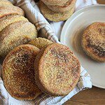 Close-up of freshly baked bread with golden crust and flour dusting.
