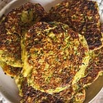 Close-up of crispy vegetable fritters on a plate.