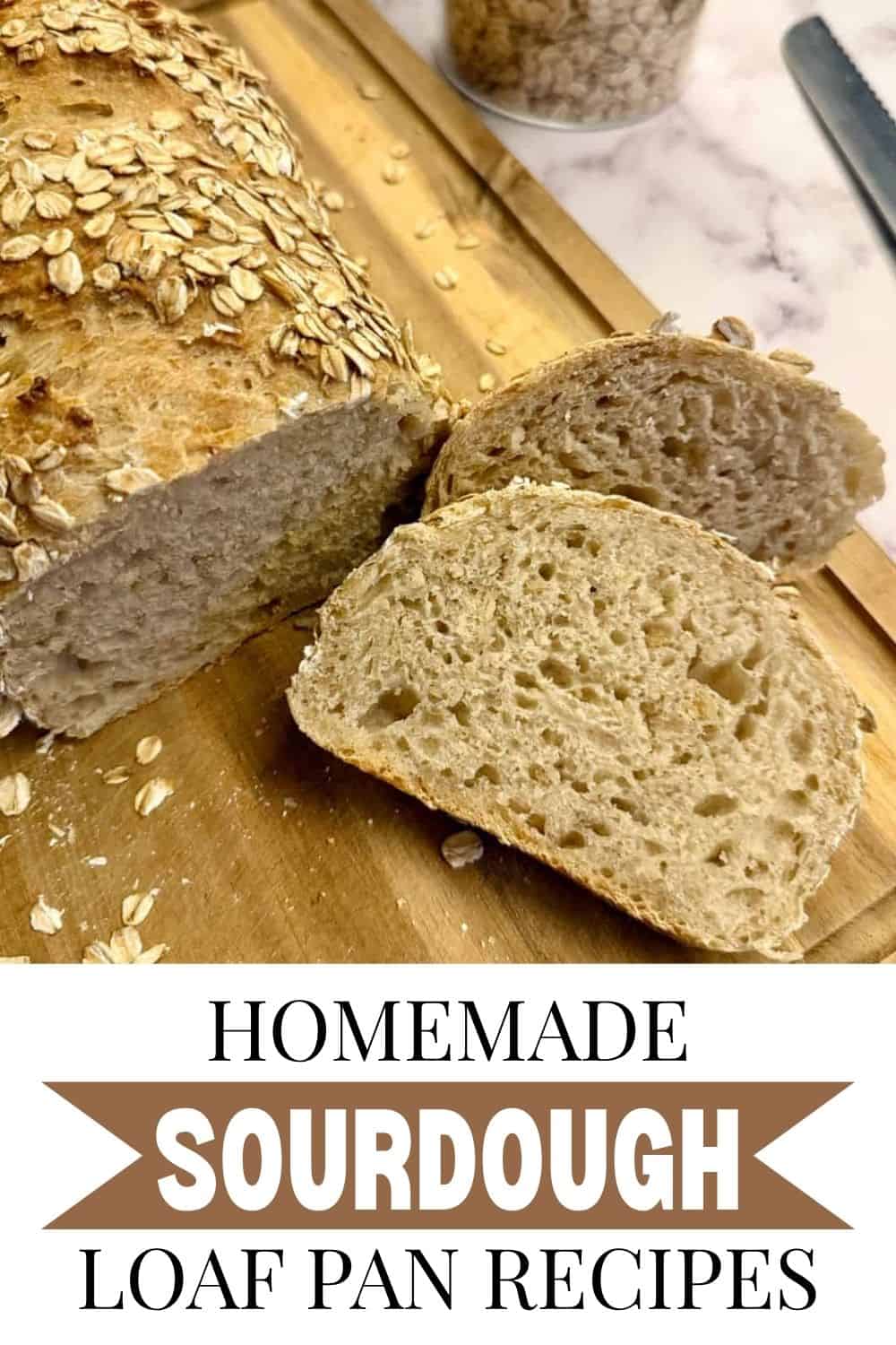 Freshly baked sourdough bread with oats on top, sliced to show soft interior.