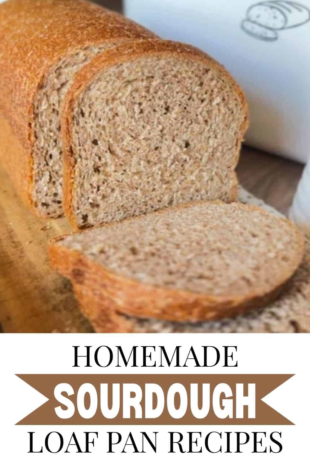 Freshly baked sourdough bread loaf with a slice cut, showcasing the soft interior.