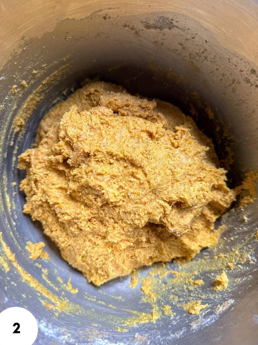 Dough for bread with stretch and folds technique in a mixing bowl.