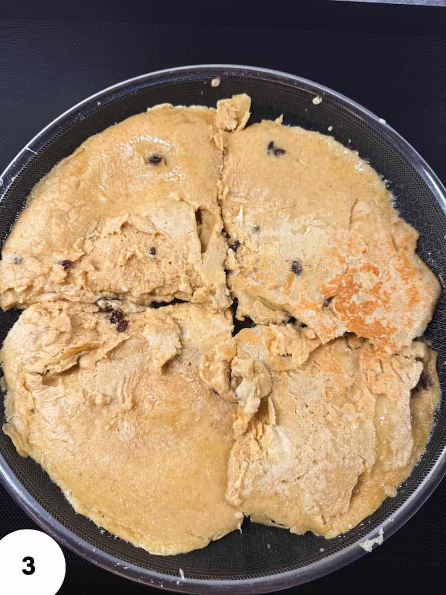 Close-up of sourdough bread dough in a bowl for stretch and folds process.