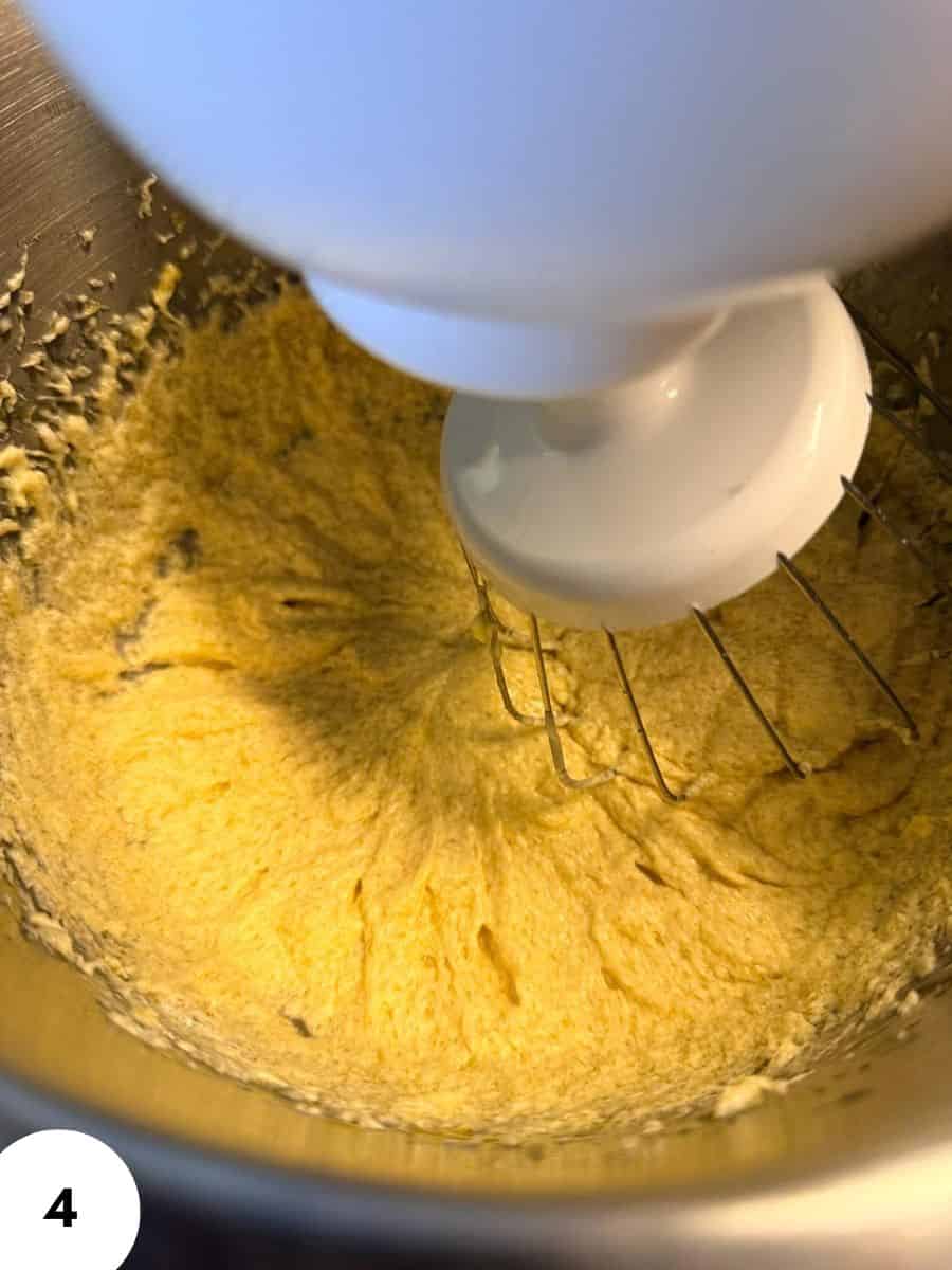 Einkorn banana bread batter being mixed with a stand mixer.