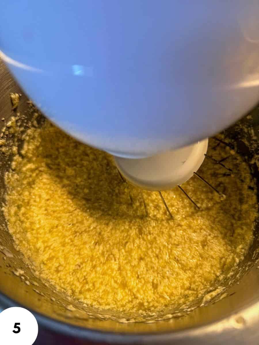 Einkorn banana bread batter being mixed in a stand mixer.