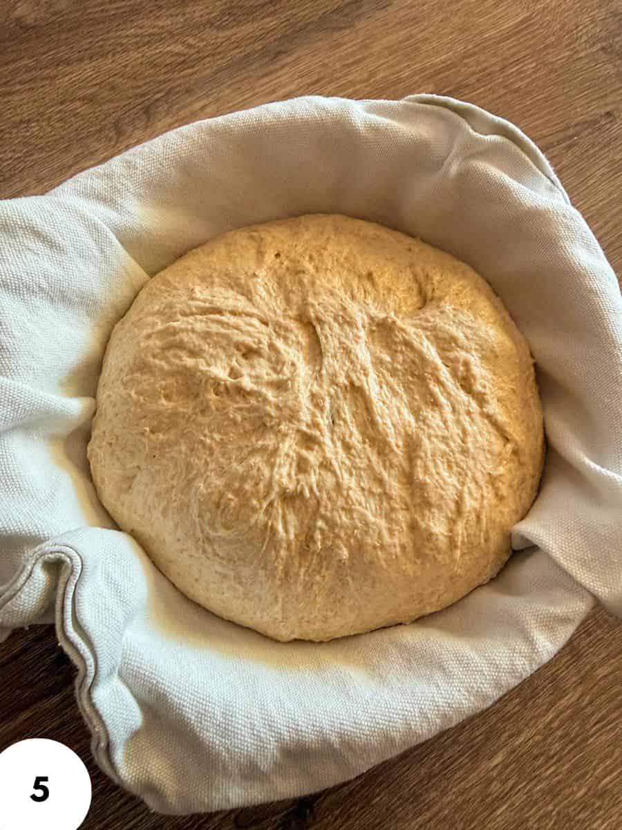 Dough in a cloth proofing basket ready for baking.