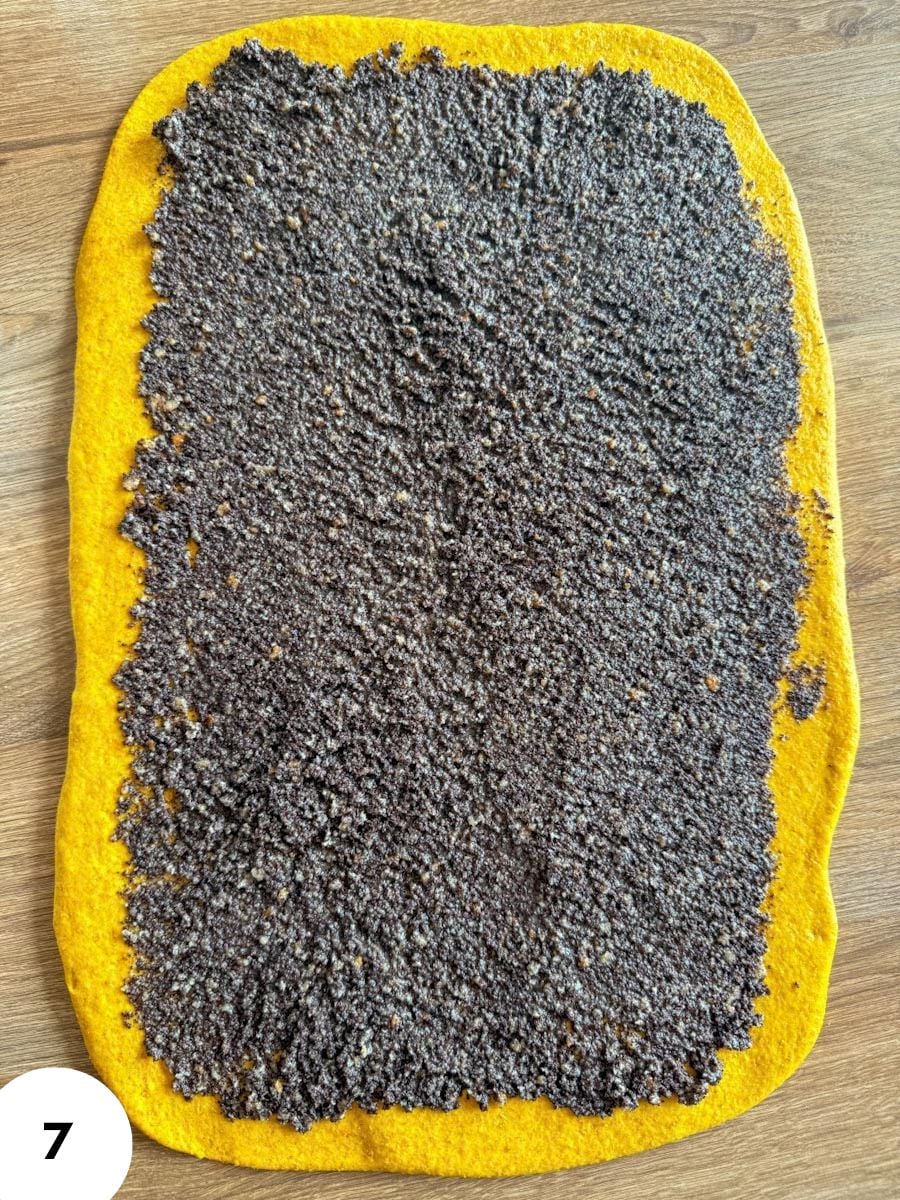 Bread dough with poppy seeds for stretch and fold technique.