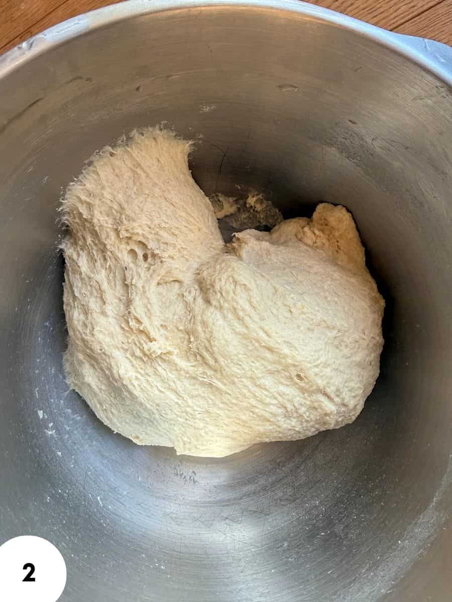 Dough in mixing bowl for stretch and fold bread technique.