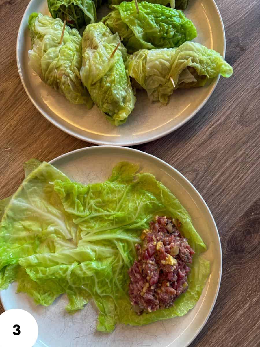 Stretched lettuce leaves with filling on plate for healthy bite.