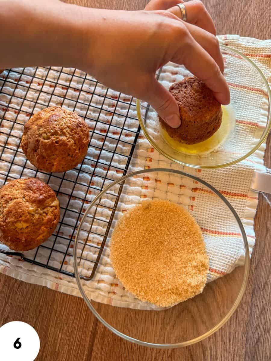 Baker performing stretch and fold technique with bread dough.