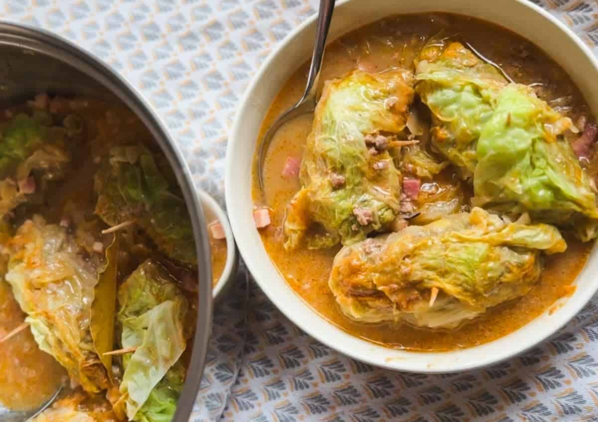 Savory stuffed cabbage leaves in a rich tomato-based sauce.